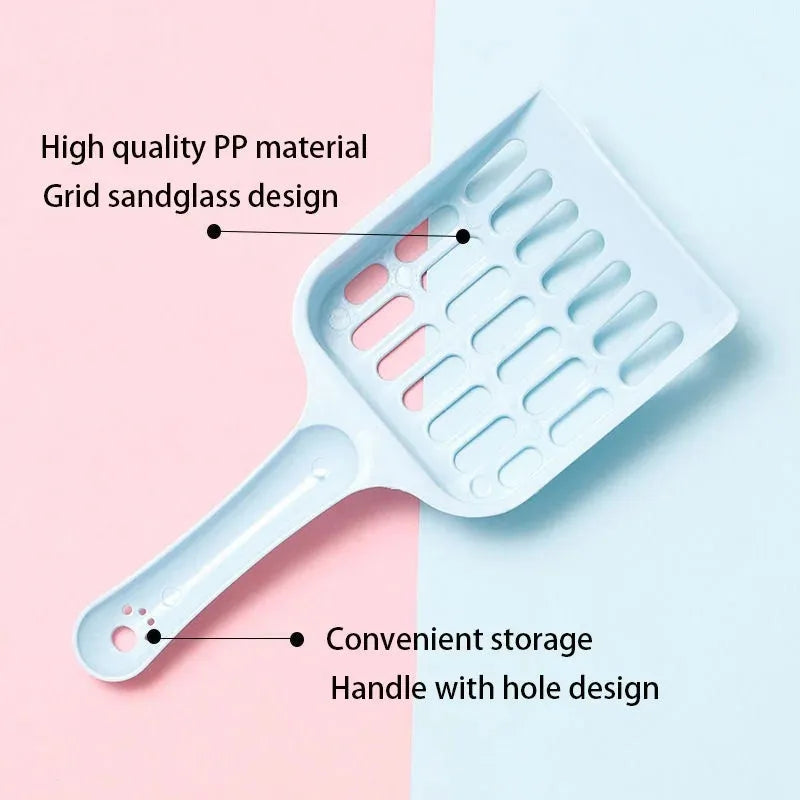 Blue plastic cat litter scoop on a white background