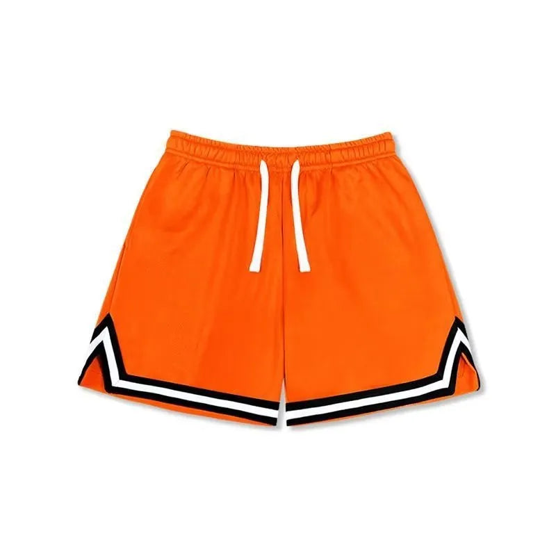 Man wearing loose grey sports shorts made from elastic polyester fabric.