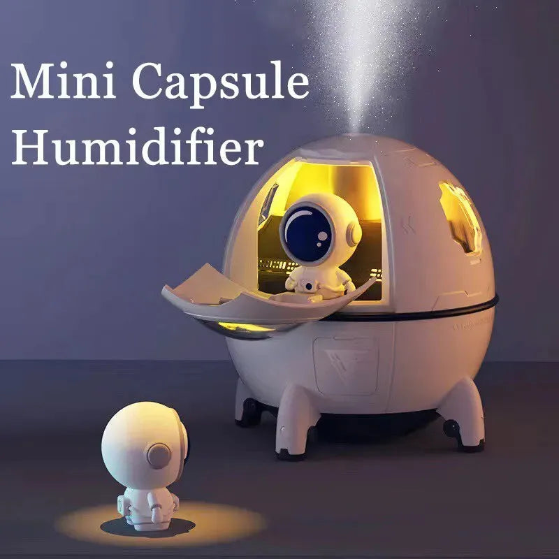 Astronaut-themed portable desktop humidifier with USB cable and colourful LED lighting