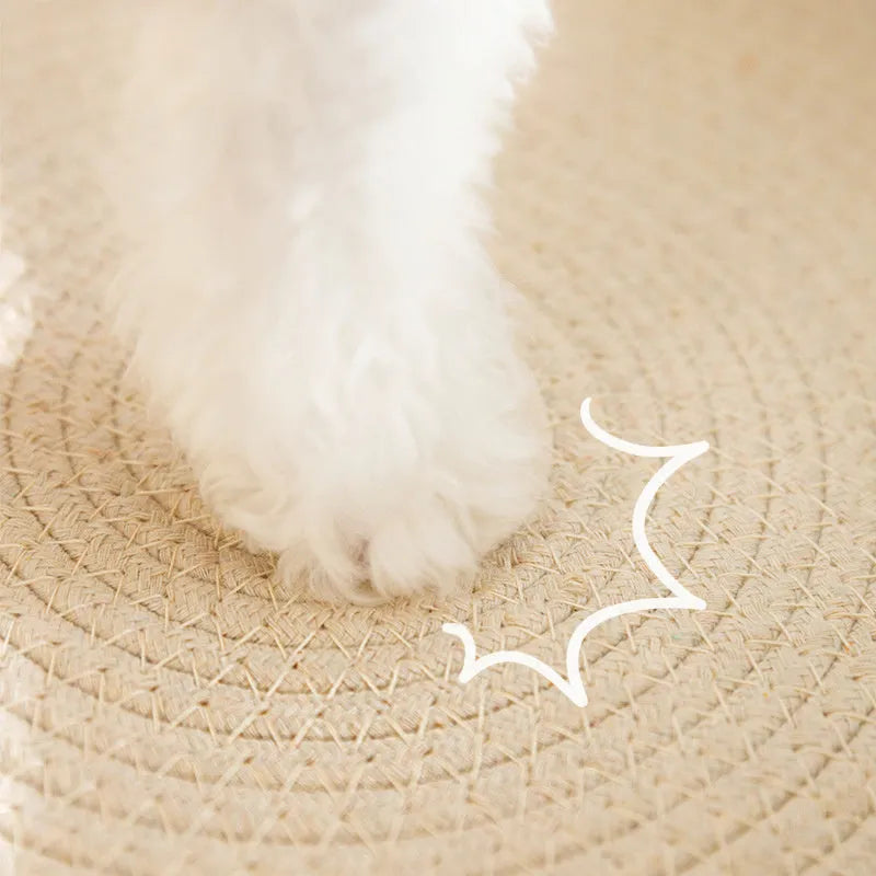 Green oval sisal cat scratching pad and bed measuring 650mm long