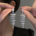 Silver Pagoda Christmas tree drop earrings with copper construction and ear stud fitting