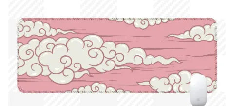 Large cloud pattern desk mat with non-slip rubber base on a wooden table.
