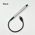 Spiral-shaped USB LED night light in metallic finish with aluminium alloy shade and metal base.