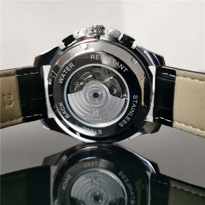 Men's automatic mechanical watch with 12mm case in black steel, silver, and gold finish options.