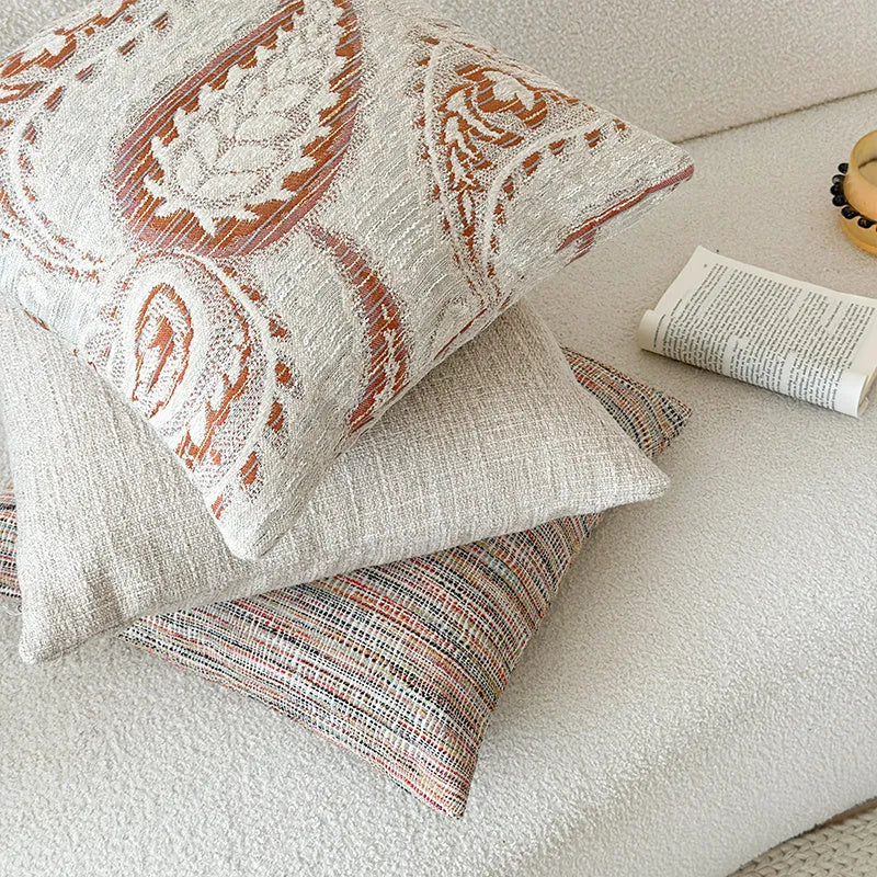 American-style Jacquard sofa backrest cushion with yarn-dyed paisley pattern in amber colour variations