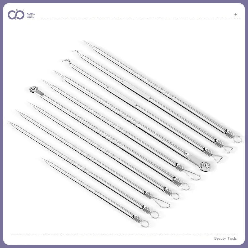 Four metal acne needles with ultra-fine pointed tips on a clean background.
