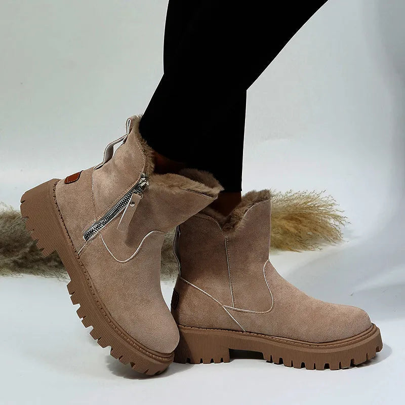 Women's black thick plush high-top snow boots with a side zipper and faux fur lining.