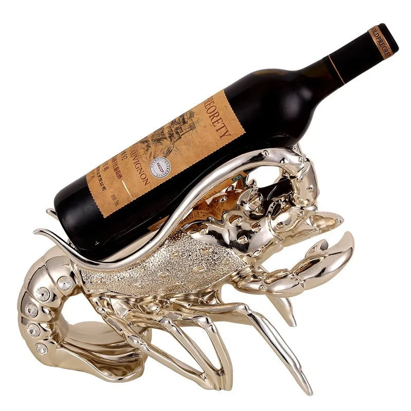 Lobster-shaped wine rack ornament in rose gold or silver, holding a single bottle.