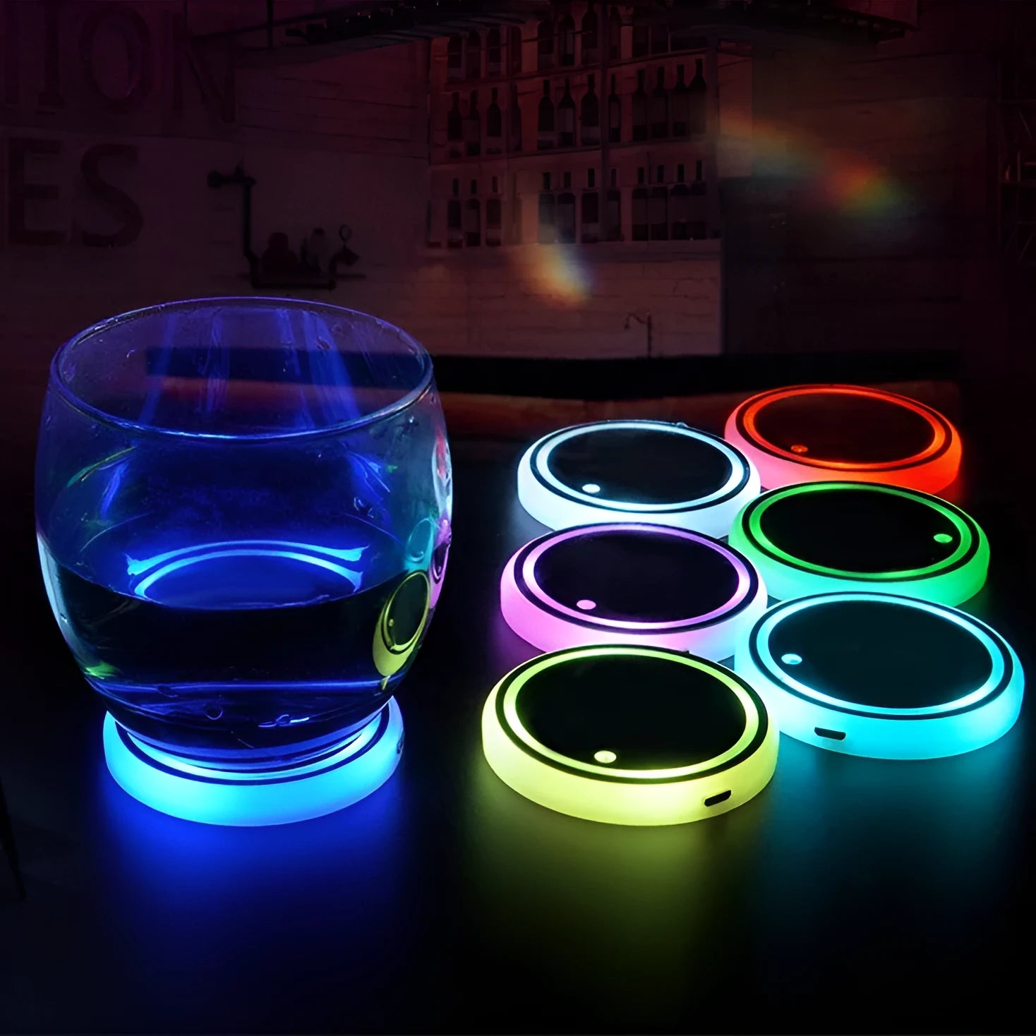Colourful LED light-up car coaster with solar panel and USB cable on a car seat