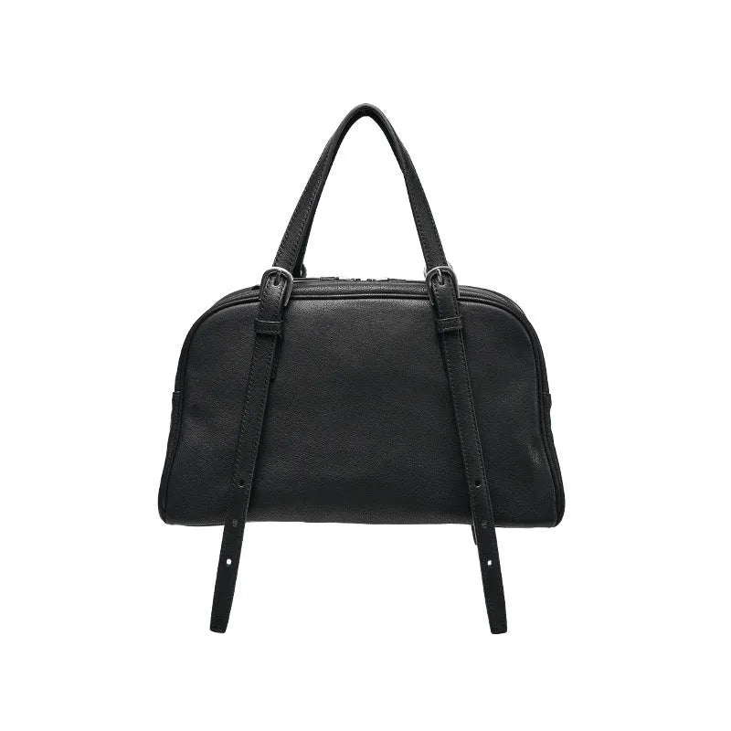 Women's genuine leather retro shoulder bag showing horizontal square design with double straps in black colour option.