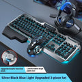 Aluminium gaming keyboard with volume knob, shown in metal grey with RGB lighting alongside optional macro mouse and headset.