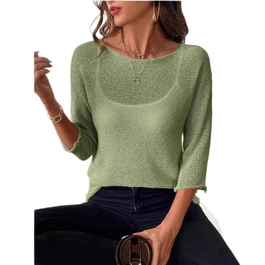 Women's off-shoulder knitted pullover top in lavender purple with a 3D pattern and 3/4 length sleeves.