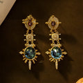 Gold geometric round stud earrings with retro court style and diamond treatment
