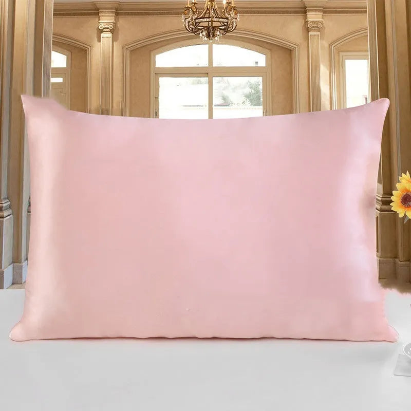 Double-sided silk pillowcase showing reversible design in apricot colour with three size options displayed