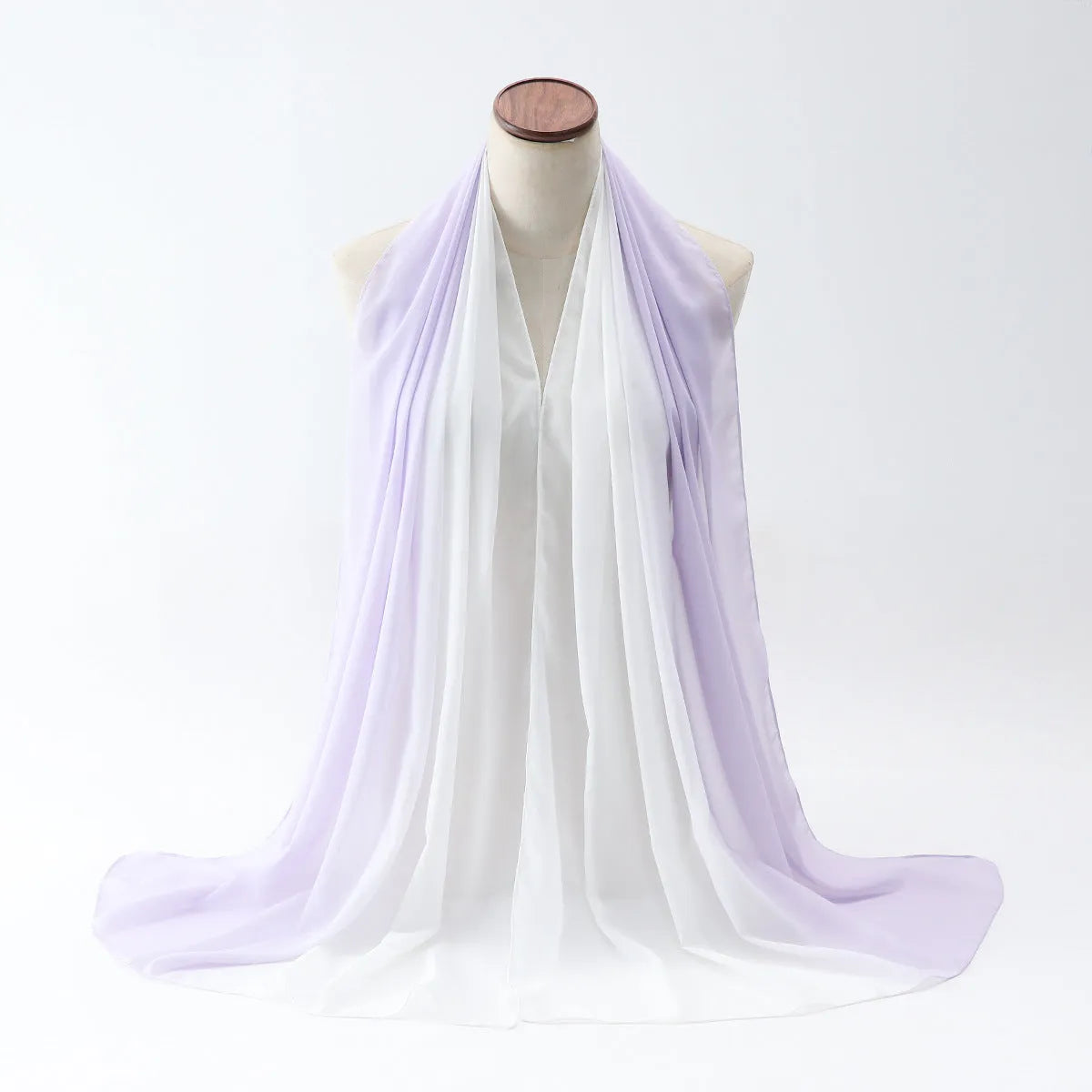 Long lightweight chiffon summer scarf for women draped to show its 175cm length and soft fabric.