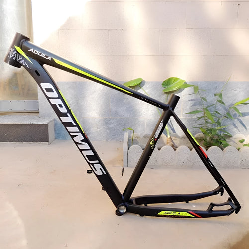 Black green 29-inch aluminium mountain bike frame with disc brake mount and internal cable routing ports.