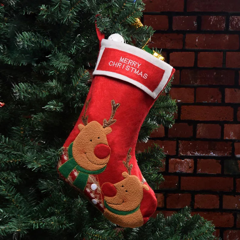 Non-woven fabric Christmas stocking ornament with elk, elderly man, and snowman folk art designs.