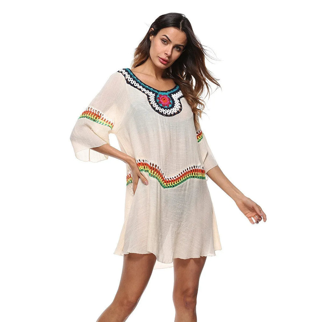 Crocheted ethnic style women's sun protection clothing in apricot colour for beach wear.