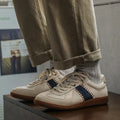 White men's casual exercise sneakers with mesh upper and low flat heel