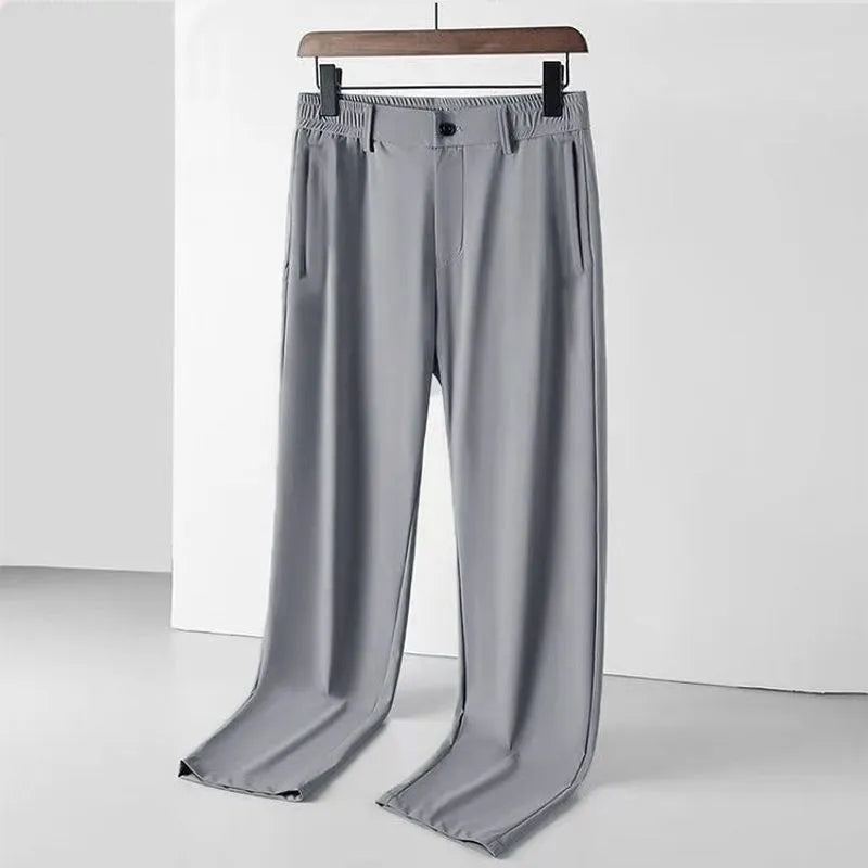Men's black ice silk straight-leg loose fit casual trousers with a high elastic waistband.