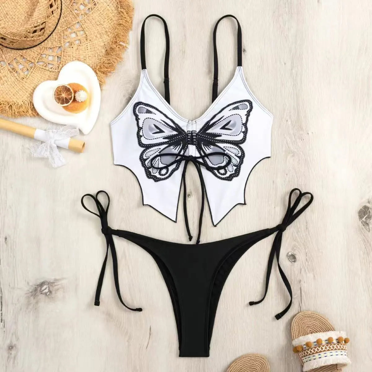 Women's purple bikini with bow ins style back detailing and briefs bottoms