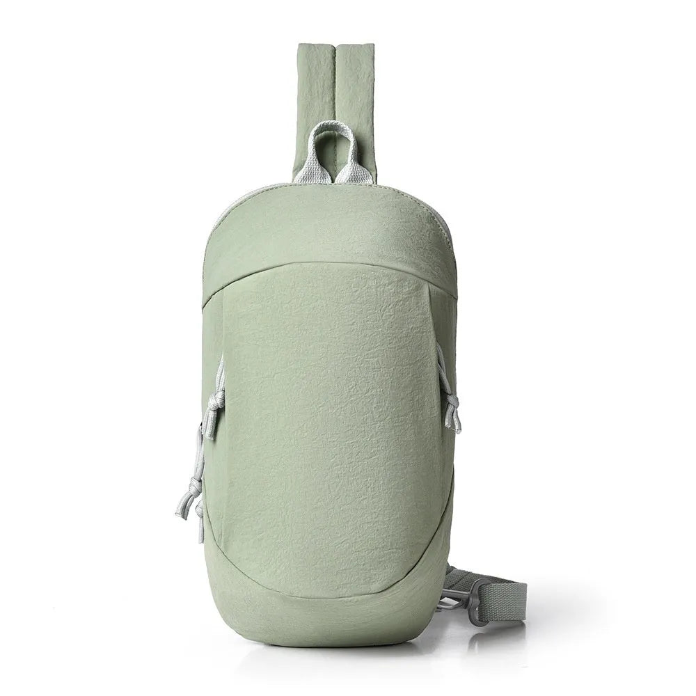 Girls outdoor crossbody bag in nylon, shown in Army Green colour with a single shoulder strap.