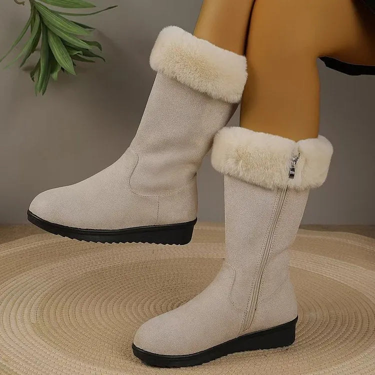 Fleece-lined mid-calf snow boots in black, with waterproof platform sole and round toe