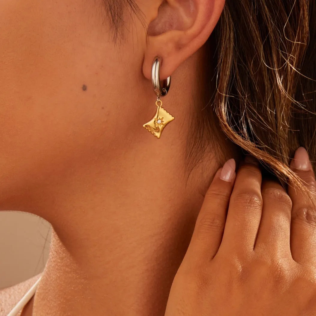 Gold Christmas tree earrings with heart and star shapes made from stainless steel with 18K plating