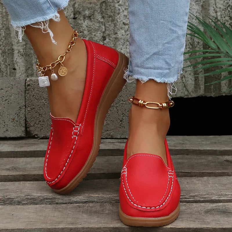 Women's flat loafers in PU leather with round toe and car suture detailing in five colour options