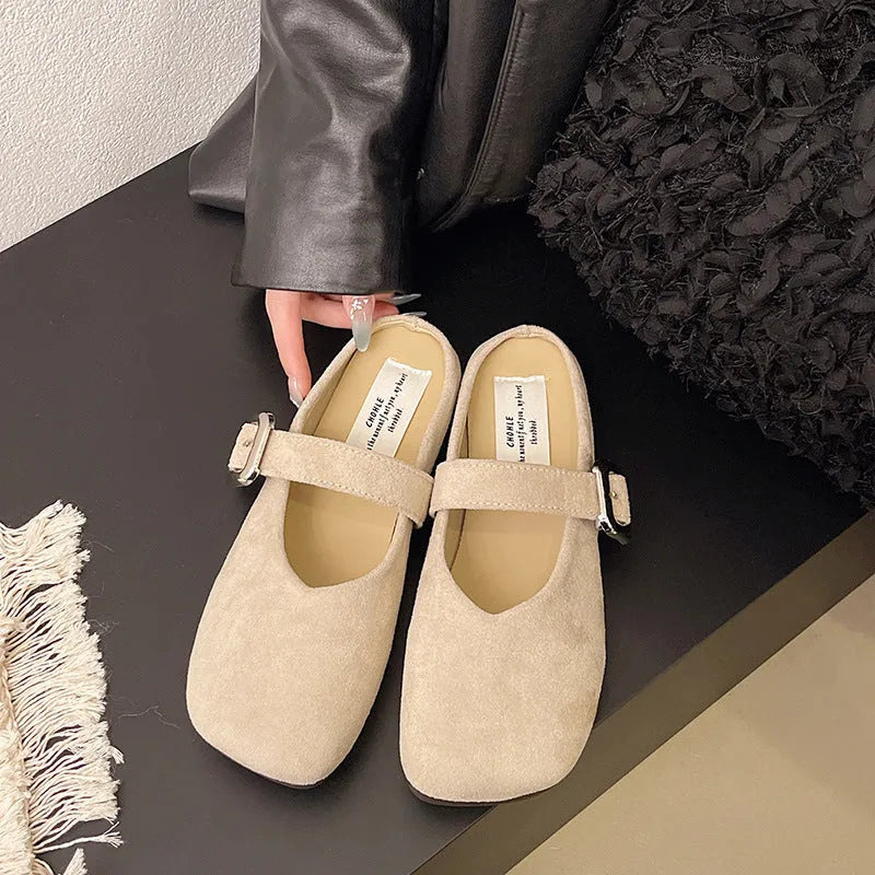 Women's flat closed toe slippers in apricot colour with a square toe and rubber sole.