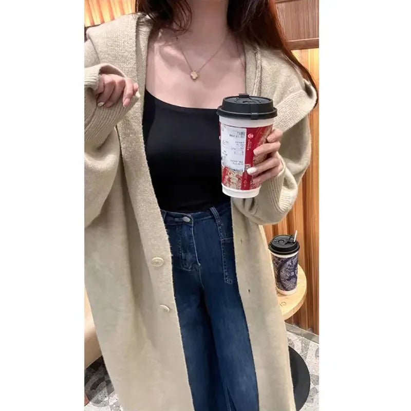 Korean style long hooded knitted cardigan coat for women in a loose free size.