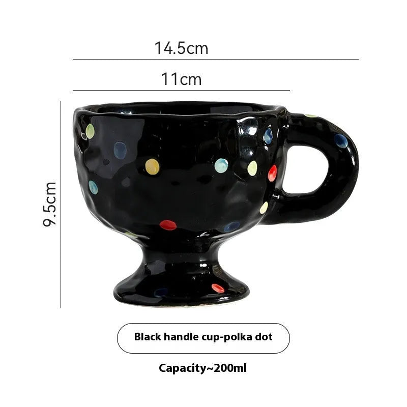 Hand-pinched irregular ceramic mug in solid colour with modern simple design