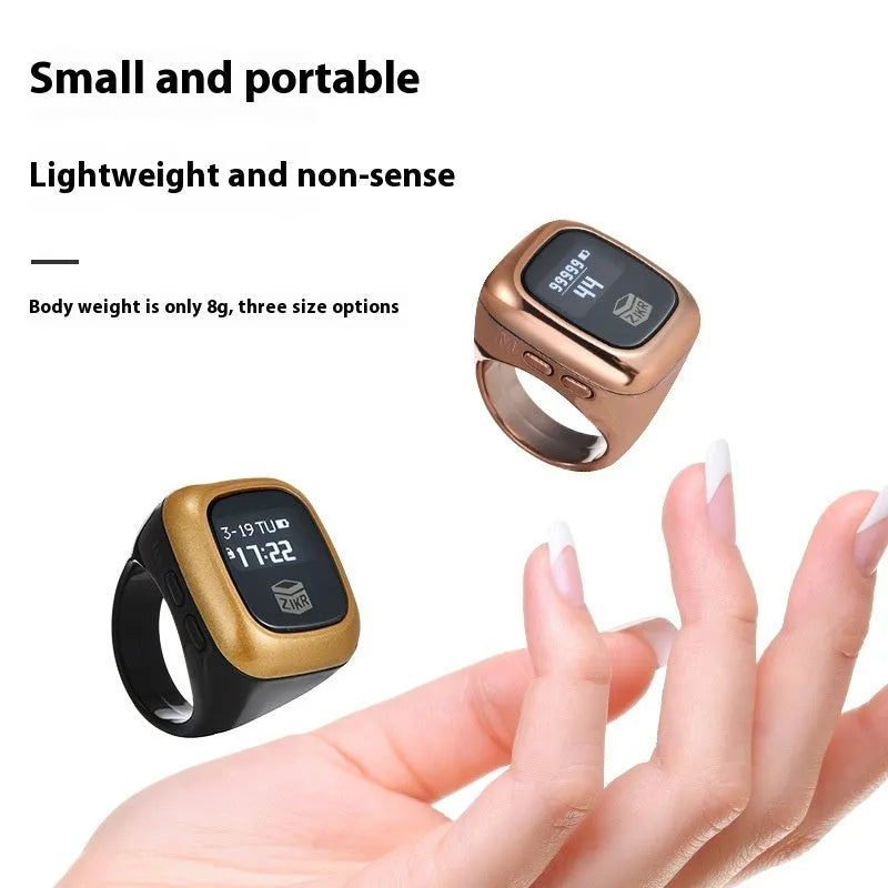 Al-Fatiha Zikr electronic counter with digital display on a wrist strap, shown in multiple colour options.