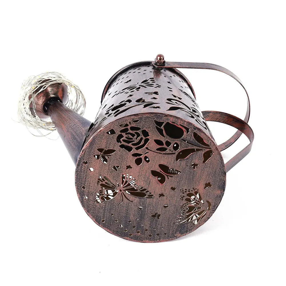 Solar garden lamp with tapered butterfly iron design and warm white LED light