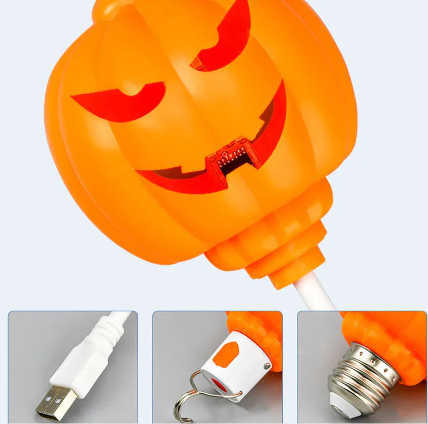Plastic pumpkin lamp with USB charging cable in yellow or purple light colour