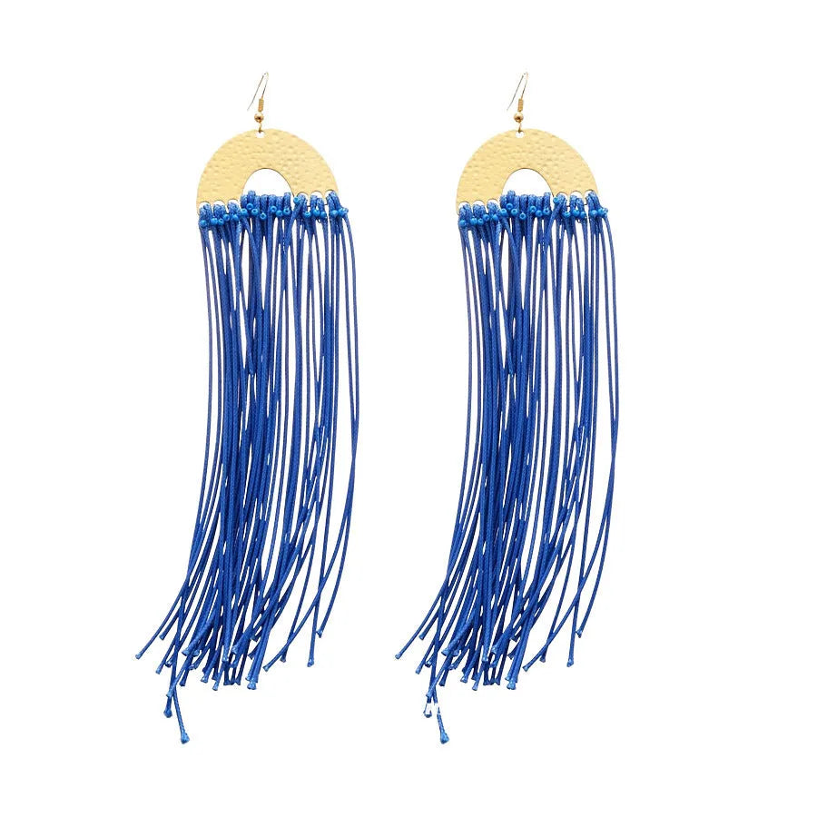 Women's geometric blue and silver fabric drop earrings with a resin flower detail.