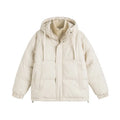 Loose beige cotton-padded jacket with side seam pockets on a hanger
