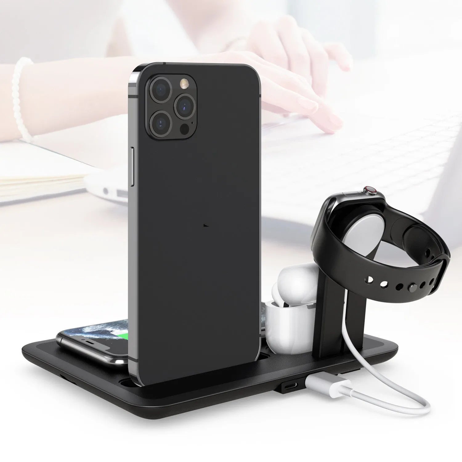 Black wireless charging desktop station with phone bracket, headphone dock and watch charging port