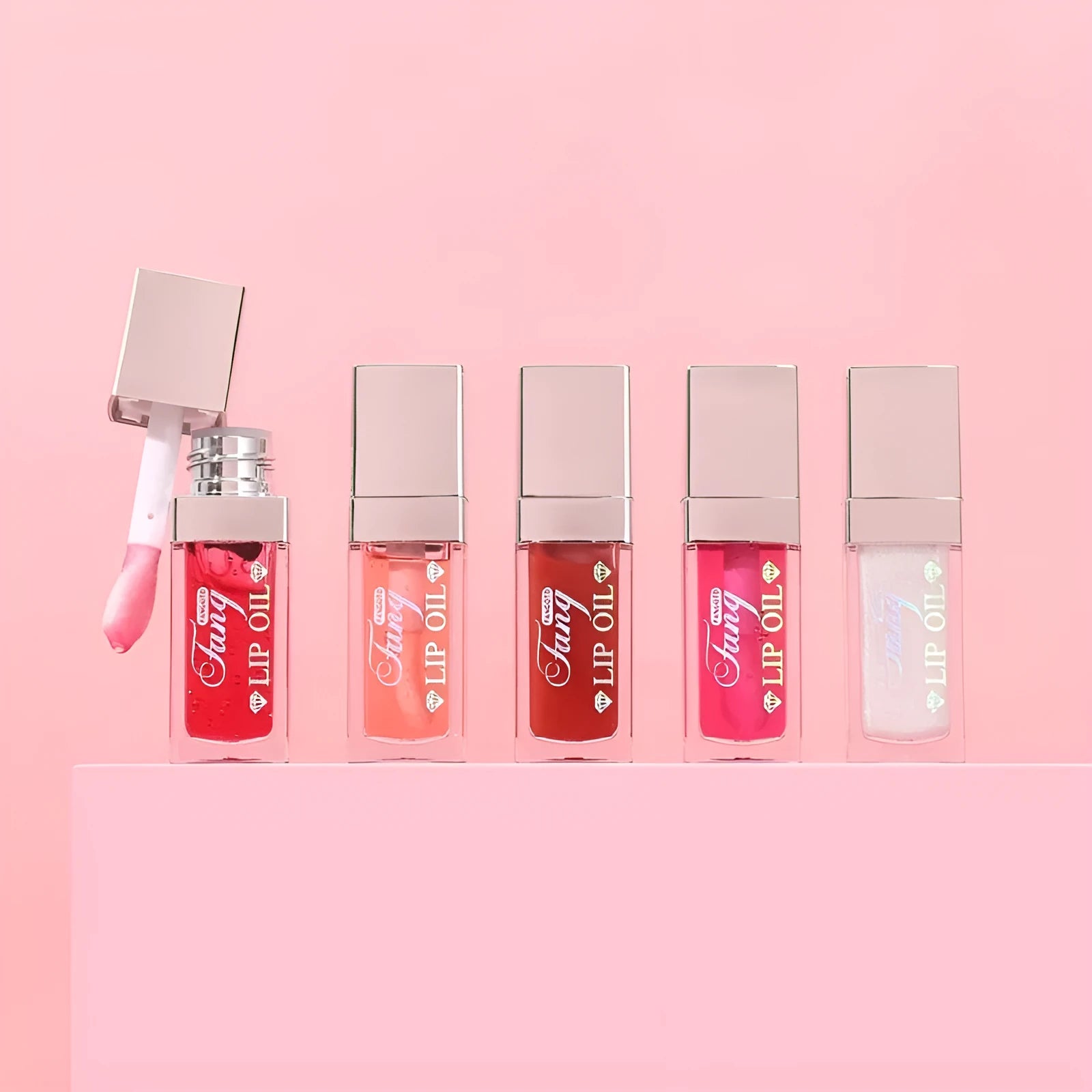 Five shades of moisturising lip gloss mint lipstick with included lip essence oil.