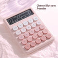 Dopamine gradient colour desk calculator in violet, pink, blue, and green options on a desk