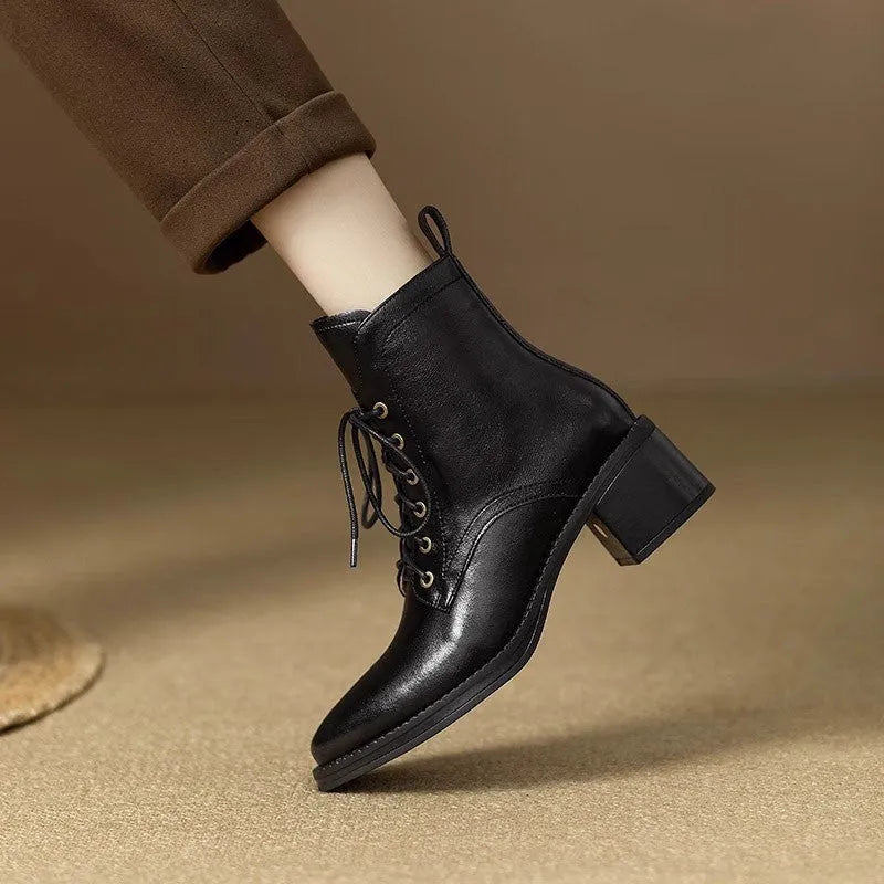 Women's black pointed-toe short tube boots with 13cm sock length and artificial PU upper