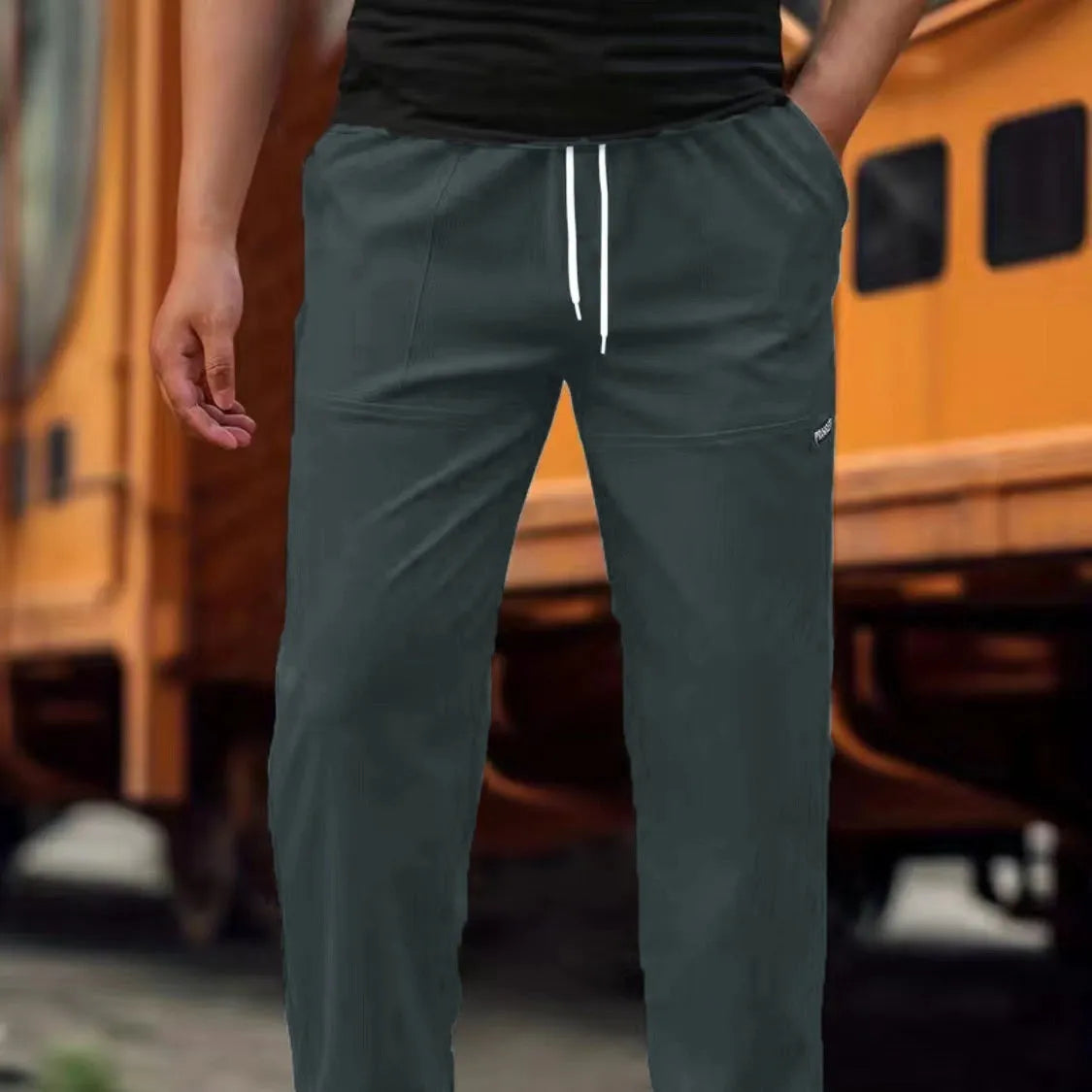 Men's polyester trousers for spring and autumn in light grey, available in sizes S to XXXL.