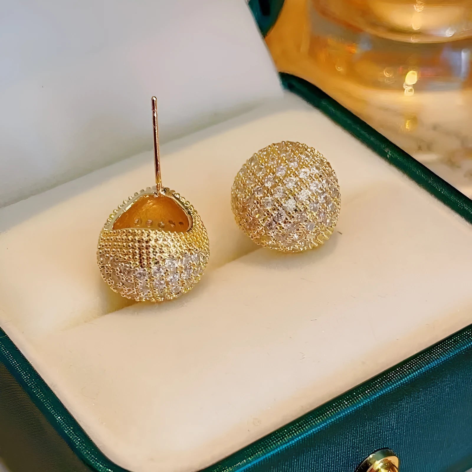 Geometric drop-shaped women's earrings with full diamond little golden beans construction in gold colour