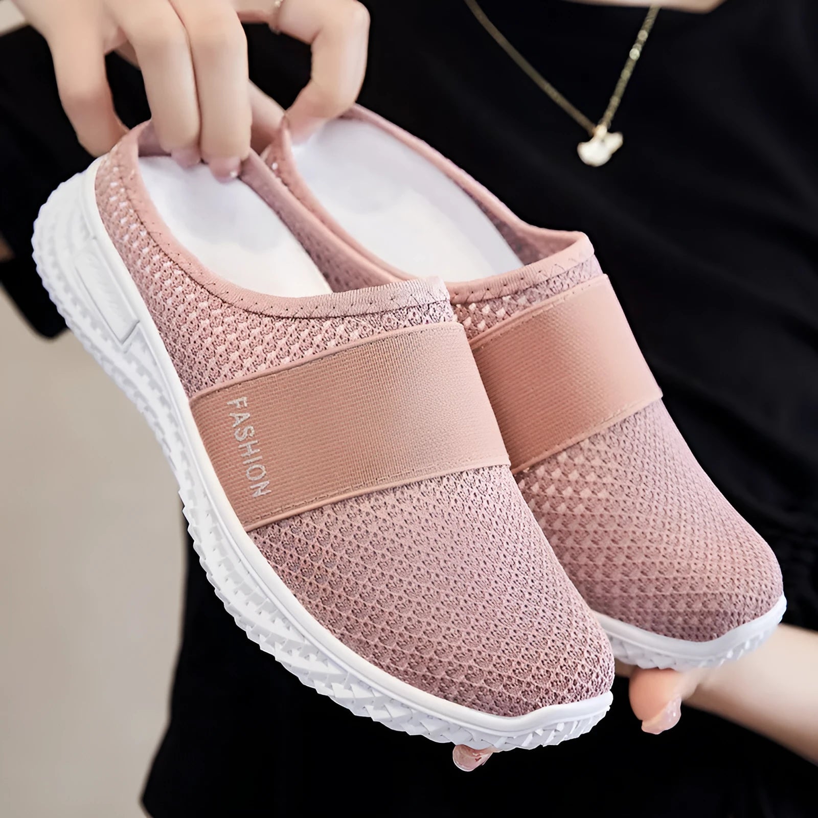 Women's breathable mesh casual shoes with hollow-out detailing and flat heel in round toe design