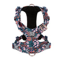 Floral pattern pure cotton dog harness vest shown in blue, green, and red colours on a size chart from XXS to XL.