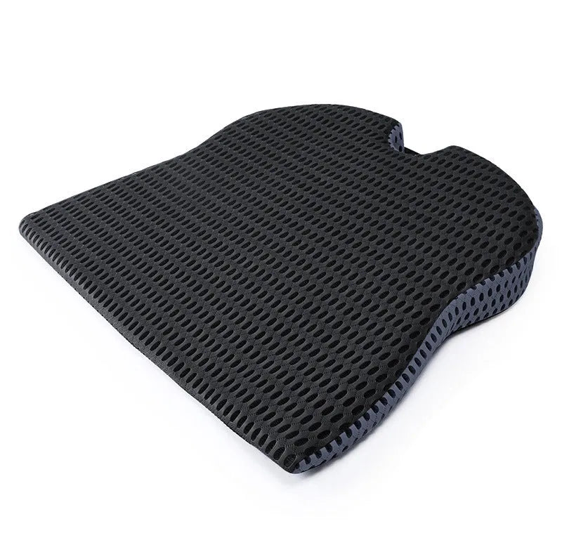 Memory foam seat cushion with strap fastening in black, grey, or milky white for car and office chairs.