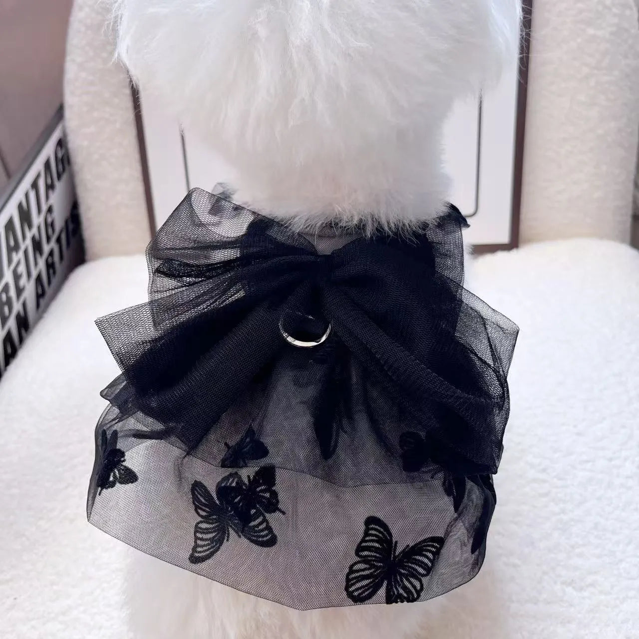 Black polyester princess tulle skirt for small dogs and cats with size chart showing chest and back measurements