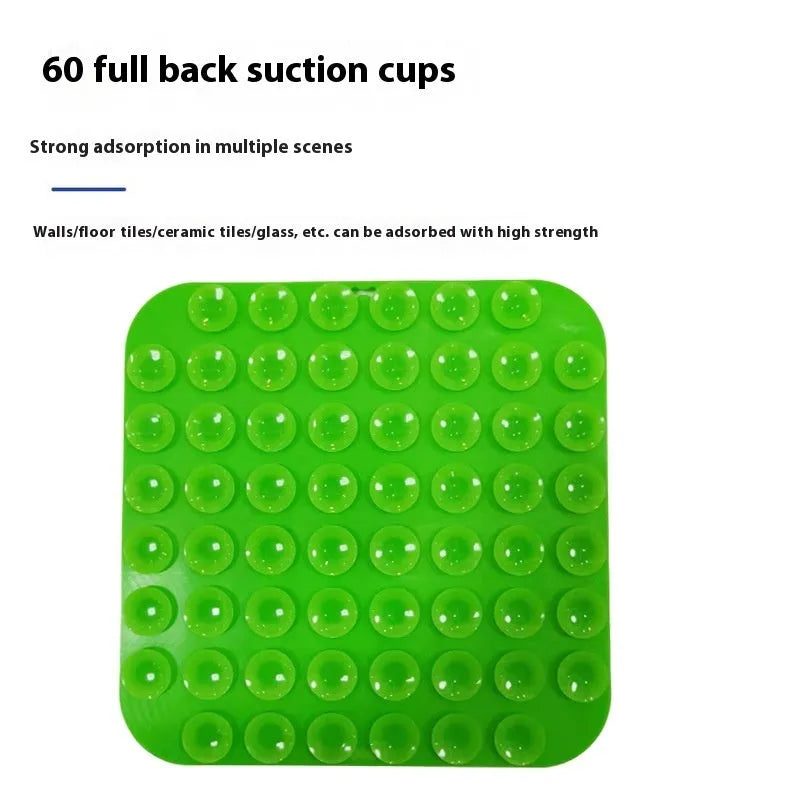 Silicone pet licking mat with suction cup on a tiled floor, featuring a slow food surface for dogs and cats