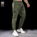 Men's waterproof quick-drying nylon workout trousers in Army Green colour showing mid waist design