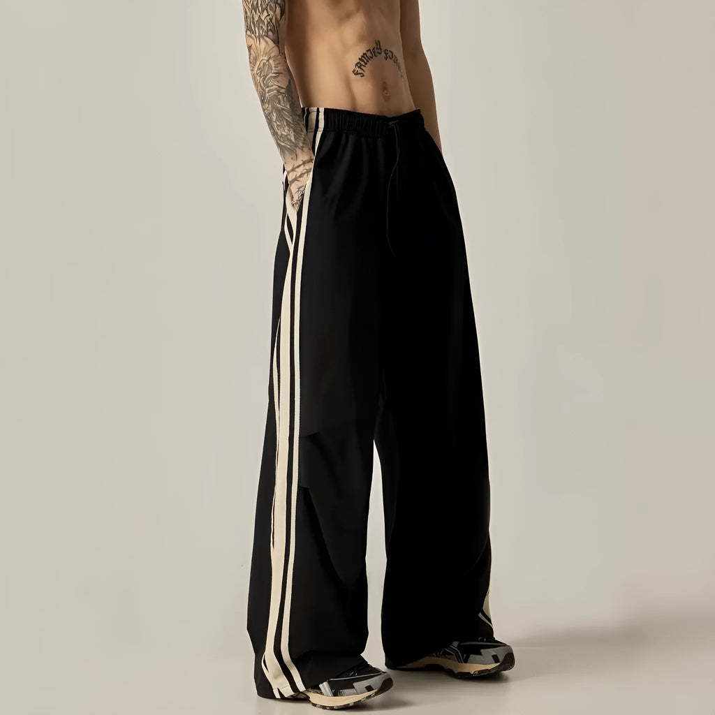 Black men's wide-leg climbing trousers with high waist and straight cut in polyester fabric